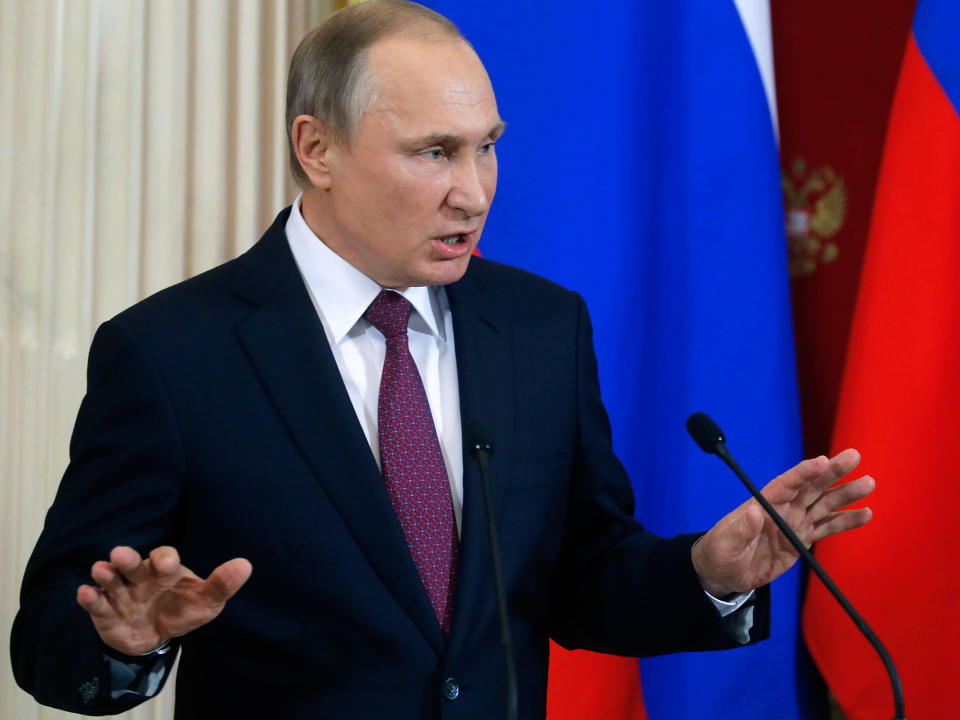 Russian President Vladimir Putin gestures as he speaks at the Kremlin in Moscow on January 17, 2017: Getty