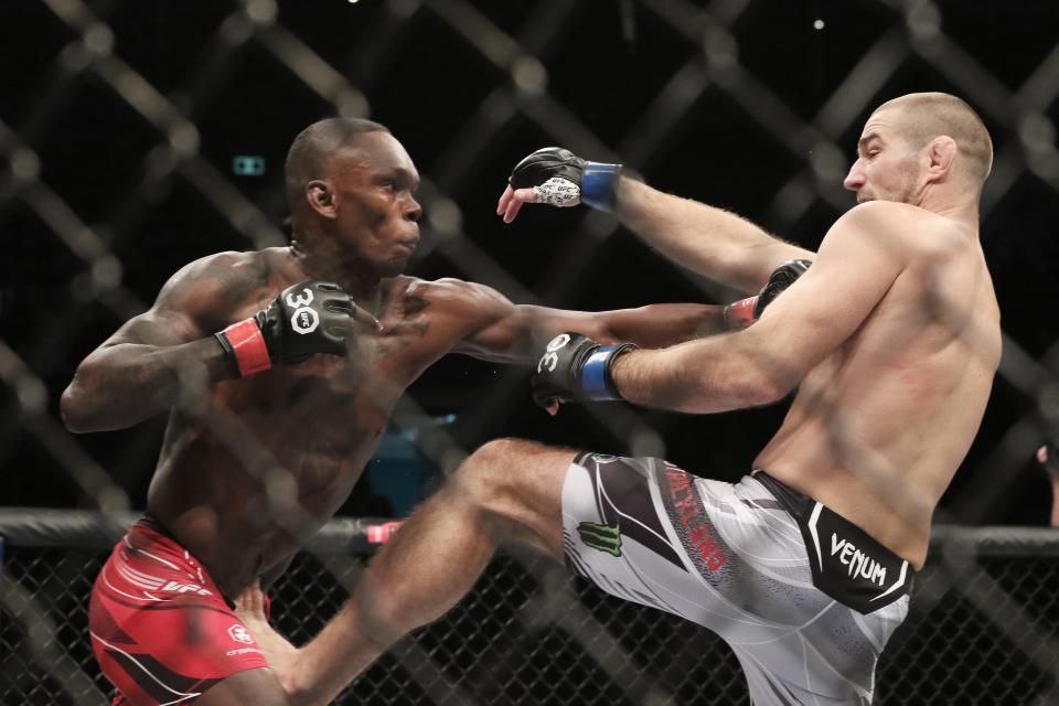 Sep 9, 2023; Sydney, NSW, AUSTRALIA; Israel Adesanya (red gloves) fights Sean Strickland (blue gloves) during UFC 293 at Qudos Bank Arena. Mandatory Credit: Jasmin Frank-USA TODAY Sports