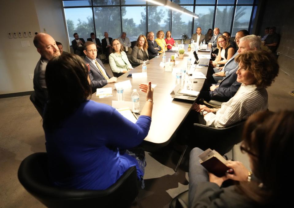 Sen. Kyrsten Sinema listens to Maria Dadgar, Inter tribal Council of Arizona, speak during a council of water experts meeting in her office in Phoenix on Oct. 17, 2022. They were discussing how to spend federal drought relief funds available for keeping Colorado River water in Lake Mead.