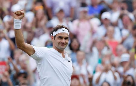 Tennis - Wimbledon - London, Britain - July 8, 2017 Switzerland’s Roger Federer celebrates winning the third round match against Germany’s Mischa Zverev REUTERS/Andrew Couldridge