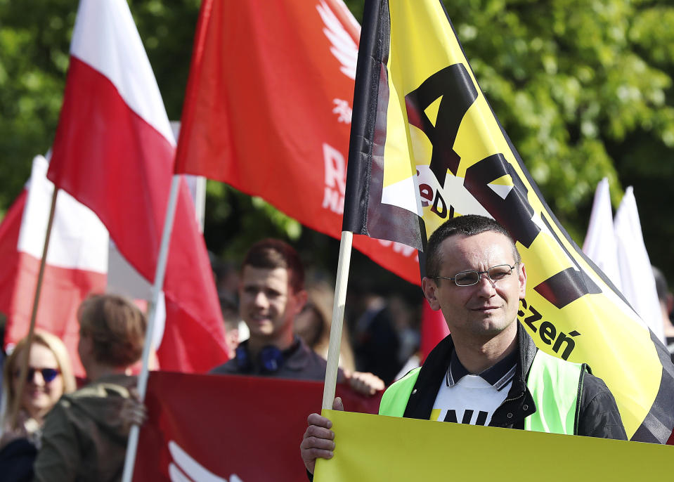 Thousands of Polish nationalists march to the U.S. Embassy, in Warsaw, Poland, Saturday, May 11, 2019. Thousands of Polish nationalists have marched to the U.S. Embassy in Warsaw, protesting that the U.S. is putting pressure on Poland to compensate Jews whose families lost property during the Holocaust. The protesters included far-right groups and their supporters. They said the United States has no right to interfere in Polish affairs and that the U.S. government is putting "Jewish interests" over the interests of Poland. (AP Photo/Czarek Sokolowski)