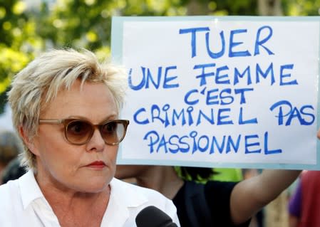 French humorist Muriel Robin attends with families of victims and activists a rally against "femicide", gender-based violence targeted at women, in Paris