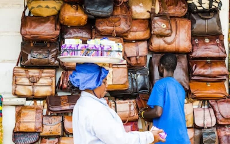 man and woman at outdoor market