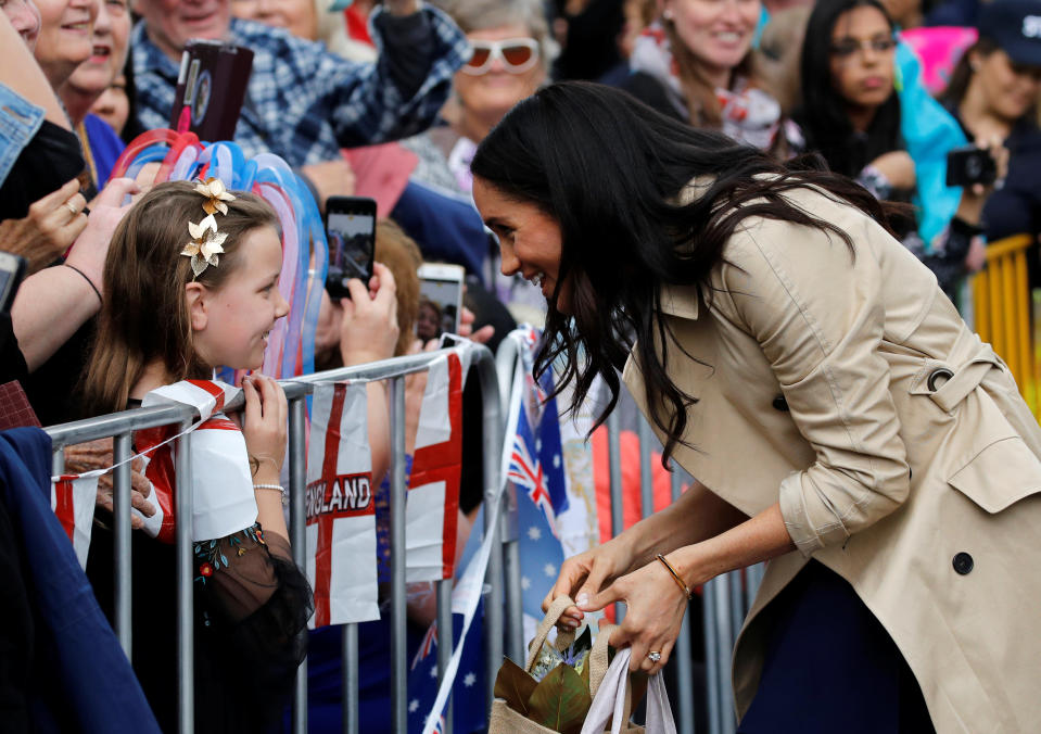 The royal pair stopped and shook hands with as many people as possible. Photo: Getty