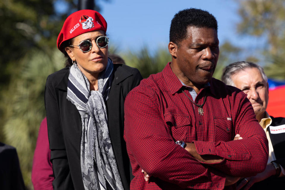 <div class="inline-image__caption"><p>Herschel Walker and his current wife, Julie Blachard, on the campaign trail.</p></div> <div class="inline-image__credit">Jessica McGowan/Getty</div>