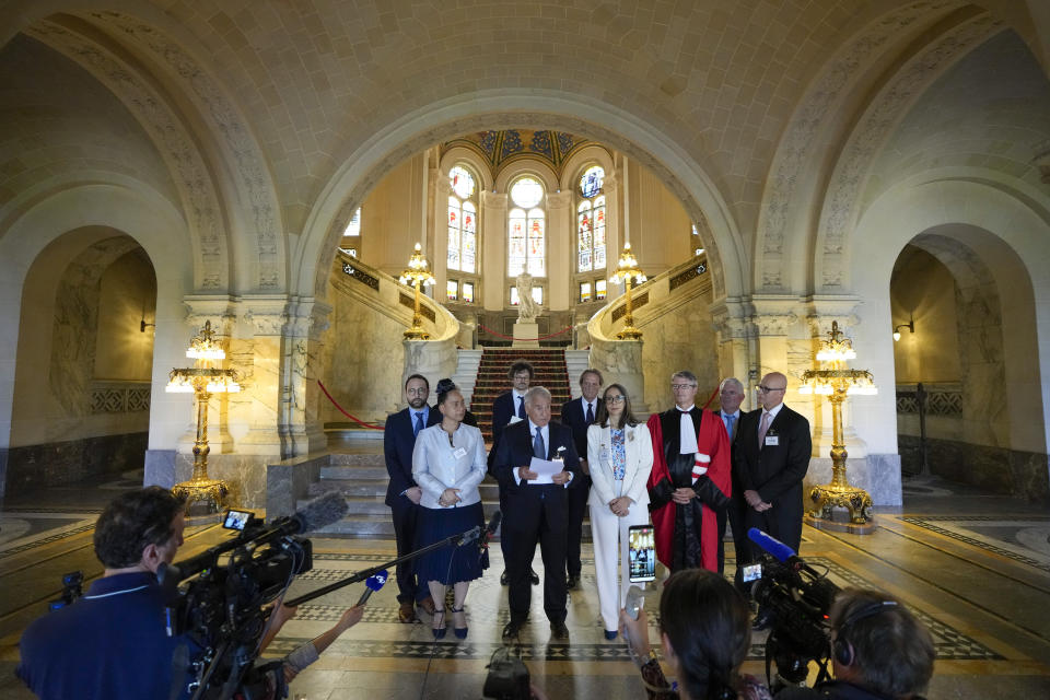 Colombia's agent Eduardo Valencia Ospina, center, and his delegation give a statement at the World Court in The Hague, Netherlands, Thursday, July 13, 2023, where the United Nations' top court rejected a case brought by Nicaragua in a decades-long maritime and sovereignty dispute in the Caribbean with neighboring Colombia. (AP Photo/Peter Dejong)