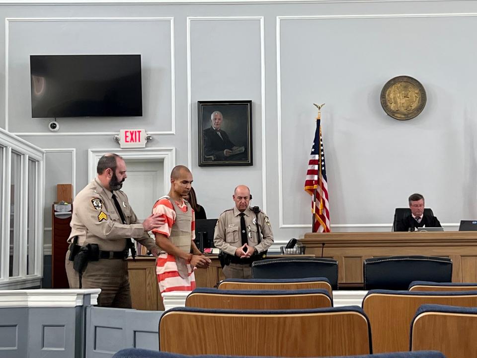 Charles Michael Haywood, 22, appears in Pender County court on Friday, Aug. 26, 2022. Haywood was arrested and charged with first-degree murder in the killing of a 42-year-old woman in Surf City this week.