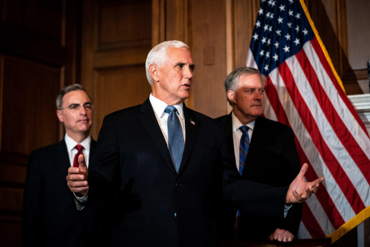 Vice President Mike Pence speaks as White House Counsel Pat Cipollone and White House Chief of Staff Mark Meadows look on at a meeting with Seventh U.S. Circuit Court Judge Amy Coney Barrett, President Donald Trump’s nominee for the U.S. Supreme Court, in preparation for her confirmation hearing, on September 29, 2020 in Washington, DC. (Photo by Erin Schaff-Pool/Getty Images)