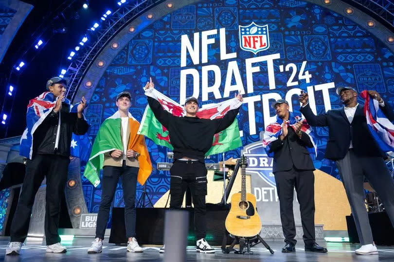 Patrick Murtagh, Charlie Smyth, Louis Rees-Zammit, Travis Clayton, and Bayron Matos are recognized on stage after day 3 of the NFL Draft. -Credit:(Photo by Luke Hales/Getty Images)