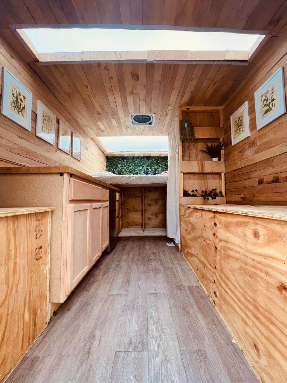 The van is fitted with wood panelling.