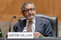 Anton Hajjar, one of the nominees for Postal Service Governors speaks at a Senate Governmental Affairs Committee hybrid nominations hearing on Capitol Hill, Thursday, April 22, 2021, in Washington. (AP Photo/Andrew Harnik)