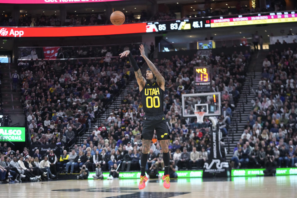 Utah Jazz guard Jordan Clarkson (00) shoots during the second half of the team's NBA basketball game against the Miami Heat on Saturday, Dec. 30, 2023, in Salt Lake City. (AP Photo/Rick Bowmer)