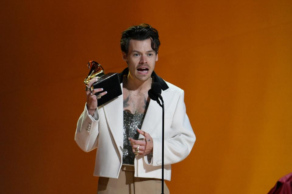 Harry Styles accepts the Grammy for best pop vocal album for “Harry's House."