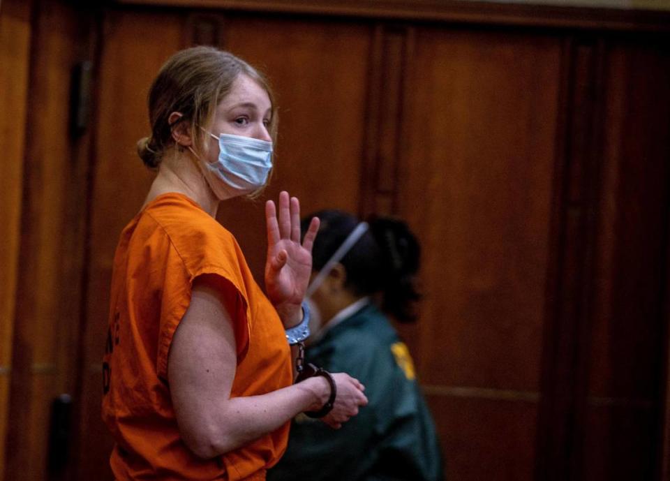 Courtney Clenney waves goodbye to her parents during an evidentiary hearing. She is the OnlyFans model accused of murdering her boyfriend Christian Obumseli last April 03 in Miami. Her defense lawyers were seeking to restrict release of evidence in the case. The Miami Herald and prosecutors oppose the move at the he hearing at the Richard E. Gerstein Justice Building, in Miami, on Tuesday September 06, 2022.