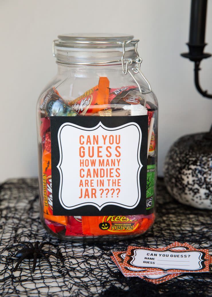 <p>Challenge your guests to this game of chance. Satisfy the winner's sweet tooth by rewarding them with the whole jar of candy.</p><p><strong>Get the tutorial at <a href="https://www.iheartnaptime.net/halloween-games/" rel="nofollow noopener" target="_blank" data-ylk="slk:I Heart Naptime;elm:context_link;itc:0;sec:content-canvas" class="link ">I Heart Naptime</a>. </strong></p><p><strong><a class="link " href="https://www.amazon.com/Anchor-Hocking-2-Gallon-Heritage-Hill/dp/B000KKI7GY/ref=sr_1_1?dchild=1&keywords=glass+jar+with+lid&qid=1626722660&sr=8-1&tag=syn-yahoo-20&ascsubtag=%5Bartid%7C10050.g.3476%5Bsrc%7Cyahoo-us" rel="nofollow noopener" target="_blank" data-ylk="slk:SHOP JARS;elm:context_link;itc:0;sec:content-canvas">SHOP JARS</a><br></strong></p>