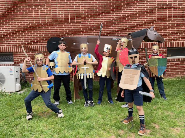 Students in Manassas, Va., show off their creations as part of a classical homeschooling curriculum that also relies on in-person lessons. (Rosario Reilly)