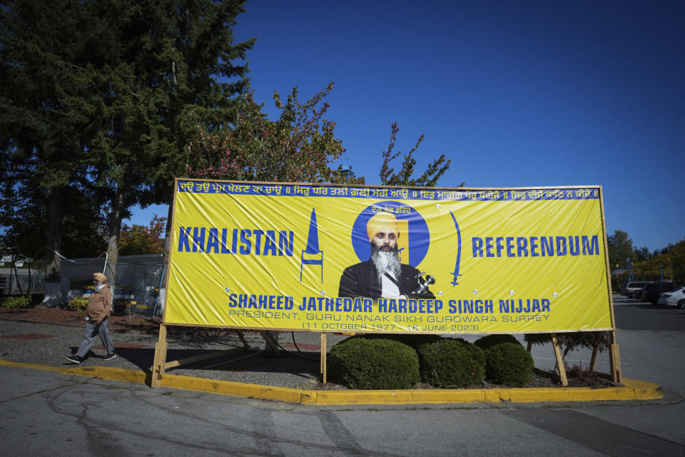 A photograph of late temple president Hardeep Singh Nijjar is seen on a banner outside the Guru Nanak Sikh Gurdwara Sahib in Surrey, British Columbia, on Monday, Sept. 18, 2023, where temple president Hardeep Singh Nijjar was gunned down in his vehicle while leaving the temple parking lot in June. Canada expelled a top Indian diplomat Monday as it investigates what Prime Minister Justin Trudeau called credible allegations that India’s government may have had links to the assassination in Canada of a Sikh activist.(Darryl Dyck/The Canadian Press via AP)