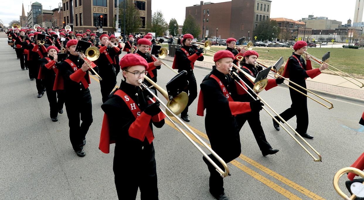 The Springfield High School band marches in the Springfield Veterans Day Parade down Capitol Avenue Friday Nov. 11, 2022.
