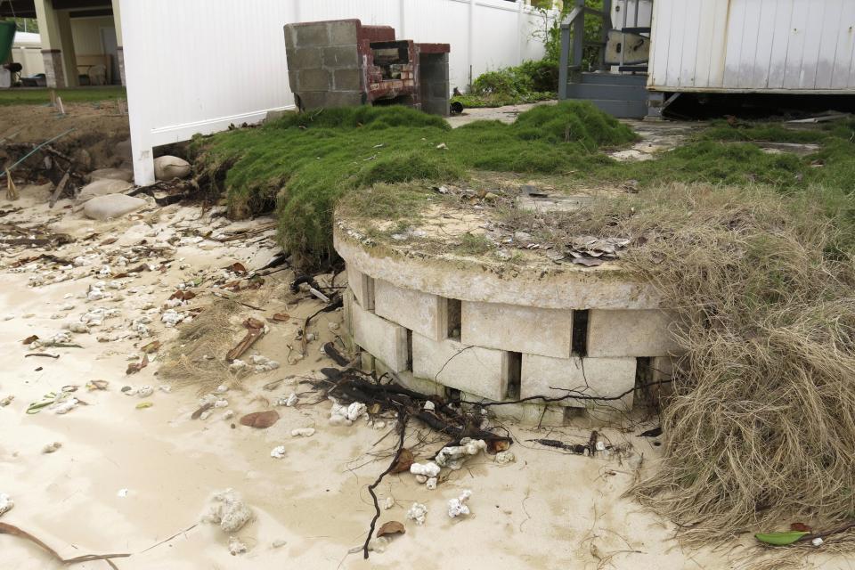 FILE - This Jan. 26, 2015 photo provided by the Hawaii Department of Land and Natural Resources shows a partially exposed cinderblock cesspool pit with a lid on an eroding shoreline in Punaluu, Hawaii. Hawaii has 83,000 of cesspools, more than any other U.S. state. (Hawaii Department of Land and Natural Resources via AP)