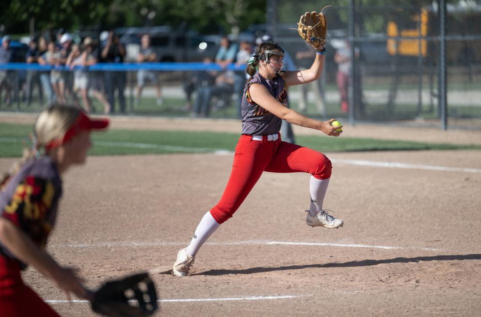 Oakdale’s Raegen Everett delivers a pitch during the Sac-Joaquin Section Division III semifinal game with Central Catholic at Central Catholic High School in Modesto, Calif., Tuesday, May 23, 2023.