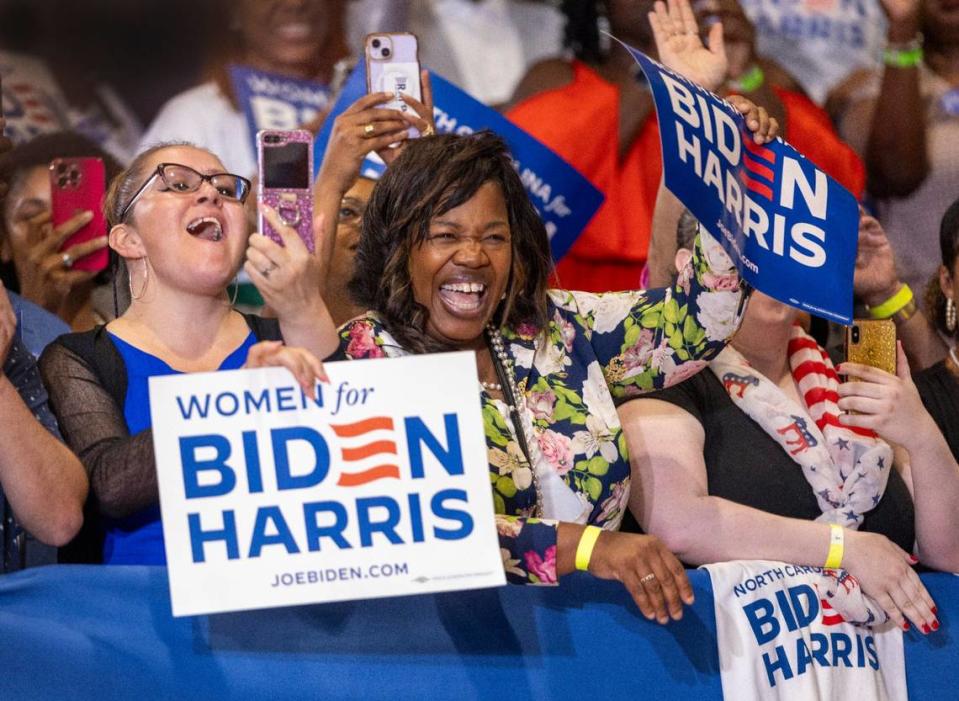 Rally attendees show their enthusiasm for Vice President Kamala Harris as she arrives at Westover High School on Thursday, July 18, 2024 in Fayetteville, N.C.