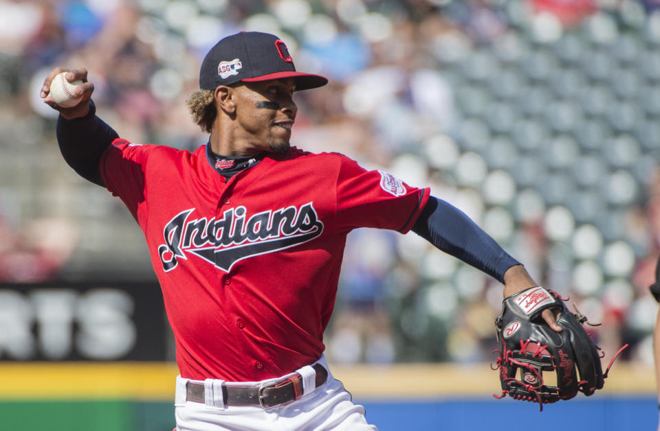 Cleveland Indians' Francisco Lindor throws out Texas Rangers' Elvis Andrus during the first inning of the second game of a baseball doubleheader in Cleveland, Wednesday, Aug. 7, 2019. (AP Photo/Phil Long)