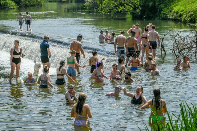 Cooling off in Warleigh Weir, Bath