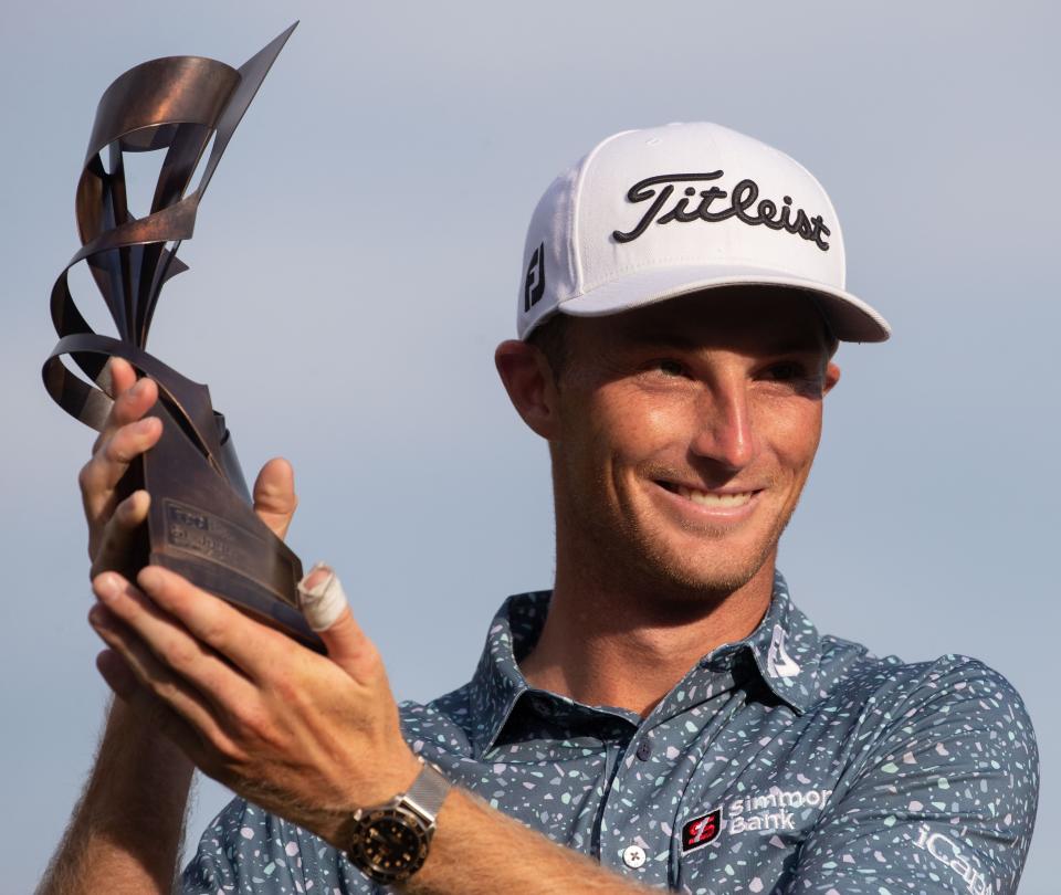 Will Zalatoris holds his his trophy after winning his first PGA tournament during the final round of the FedEx St. Jude Championship on Sunday, Aug. 14, 2022, at TPC Southwind in Memphis.