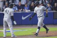 New York Yankees Gary Sanchez, right, celebrates his two=run home run with Miguel Andujar during the seventh inning of the team's baseball game against the Toronto Blue Jays, Wednesday, June 16, 2021, in Buffalo, N.Y. (AP Photo/Jeffrey T. Barnes)