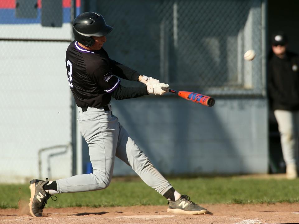 Granville Christian's Andrew Benvie hits one of his three triples against Liberty Christian on Thursday.