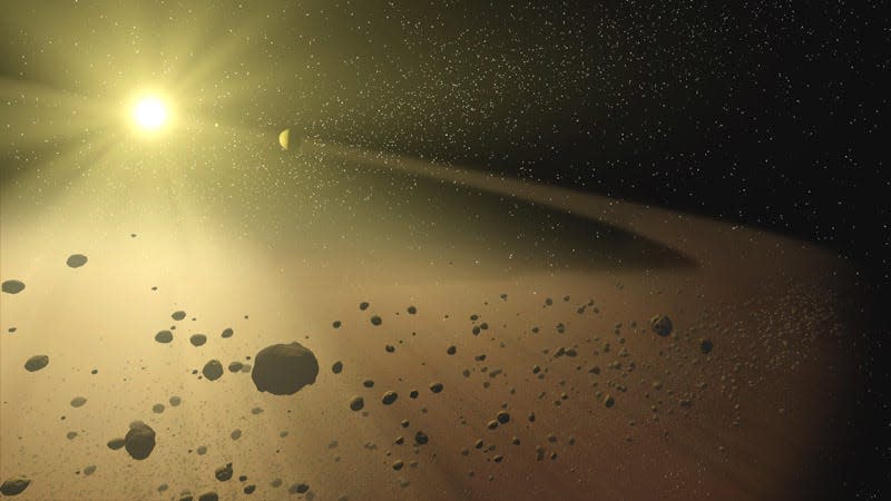 An illustration of an asteroid belt littered with space rocks. 