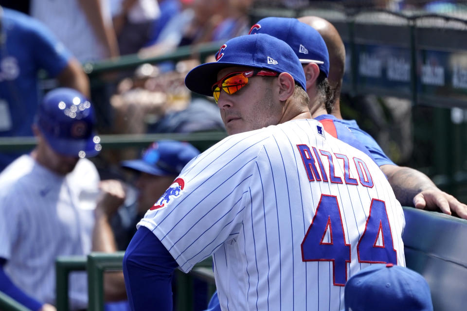 Chicago Cubs' Anthony Rizzo sits on the bench during a baseball game against the Cincinnati Reds Thursday, July 29, 2021, in Chicago. (AP Photo/Charles Rex Arbogast)