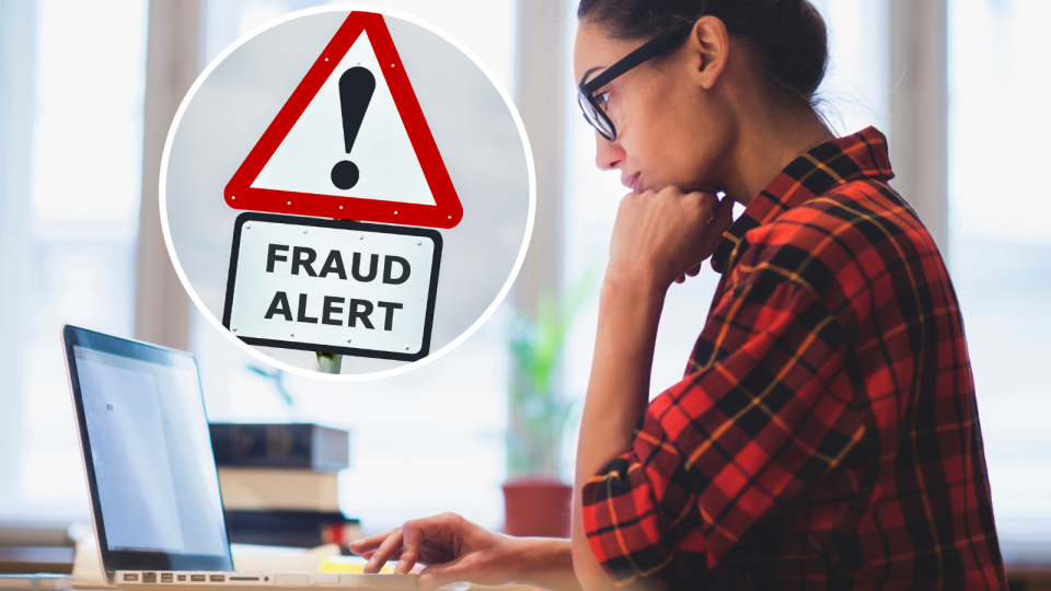 Image of woman on a laptop with fraud sign