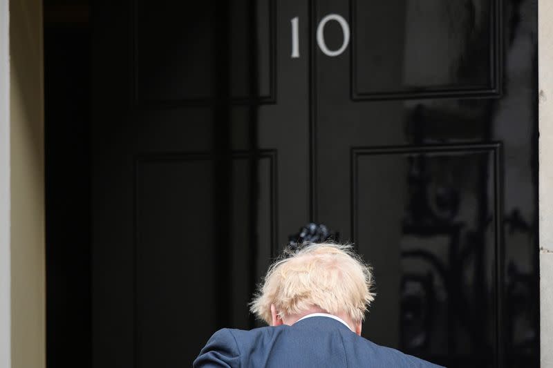 Britain's Prime Minister Boris Johnson arrives at Downing Street in London