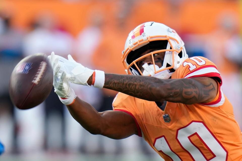 Tampa Bay Buccaneers wide receiver Trey Palmer (10) reaches but can't catch a pass against the Detroit Lions during the first half at Raymond James Stadium in Tampa, Florida, on Sunday, Oct. 15, 2023.