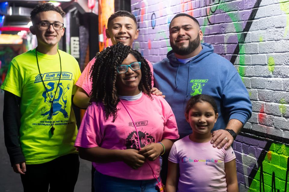 Roll 'R' Way owner Frank Quintin Jr. poses for a group photo with his children; Frank, 16, Dominic, 13, Cherish, 12, and Zendaya, 6, on Friday, December 3, 2021, in York.