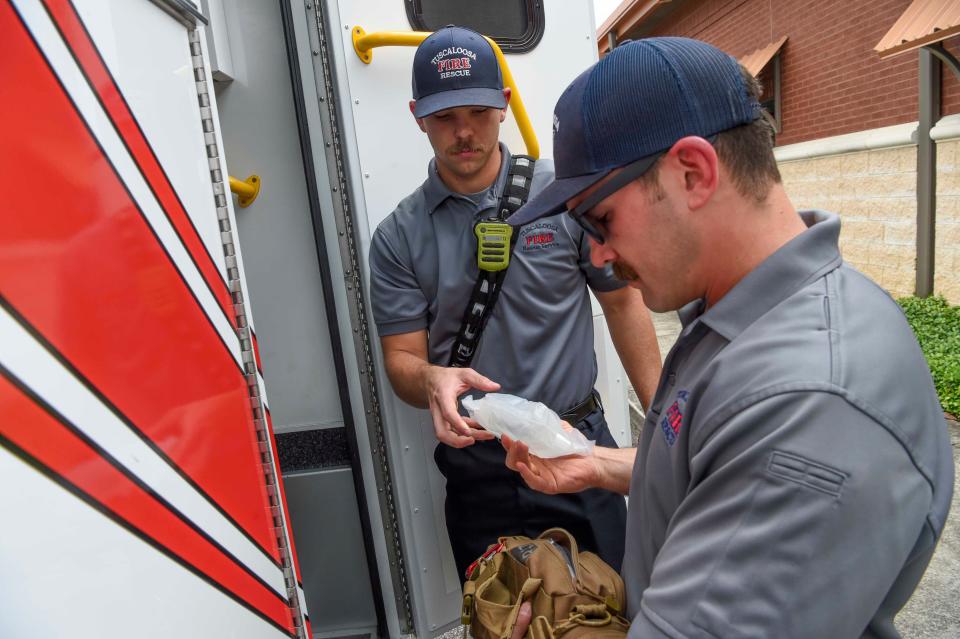 May 9 2024; Tuscaloosa, AL, USA; Tuscaloosa Fire and Rescue is now carrying blood and plasma for use with patients who have suffered traumatic injuries resulting in heavy blood loss. Paramedics Hayden Ray and Mark Purser repack the blood kit after showing it to members of the media.