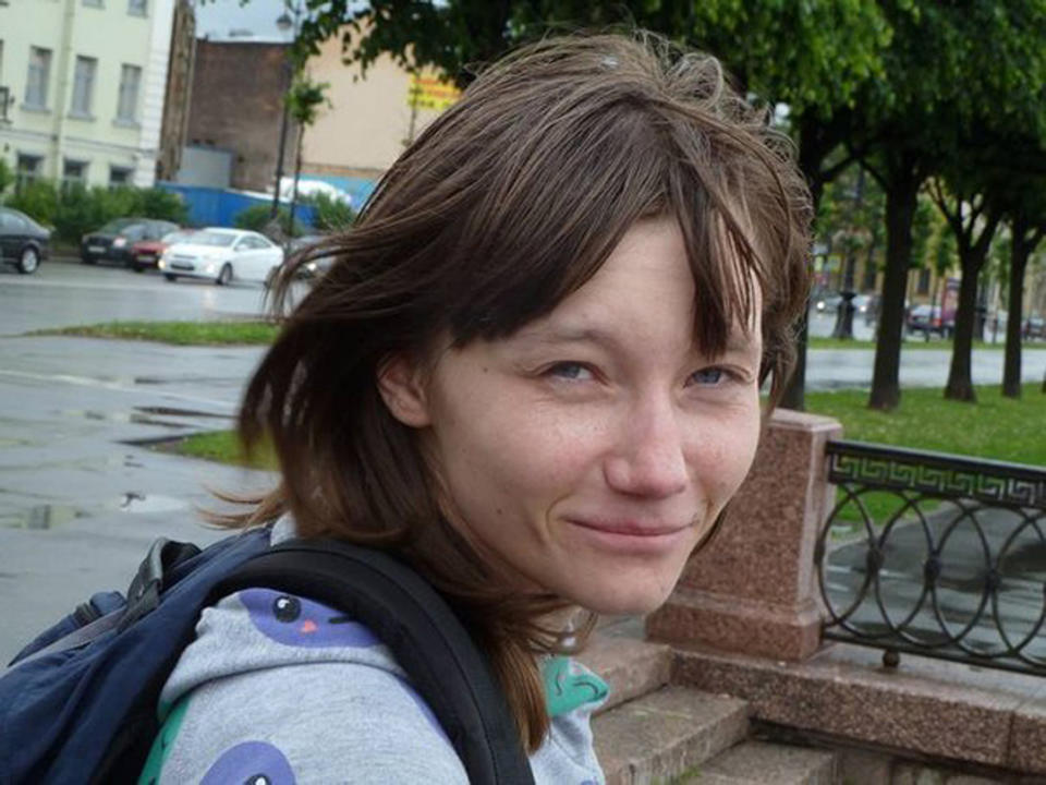 In this undated handout photo handout Yelena Klimova, shows her in a Moscow's street posing for a photo. When journalist Yelena Klimova posted an enraged column about the propaganda law to a news website, she got a reaction she didn't expect: An underage lesbian from provincial Russia reached out to thank her for the column, saying it had helped keep her from committing suicide. (AP Photo/Yan Vesenberg)