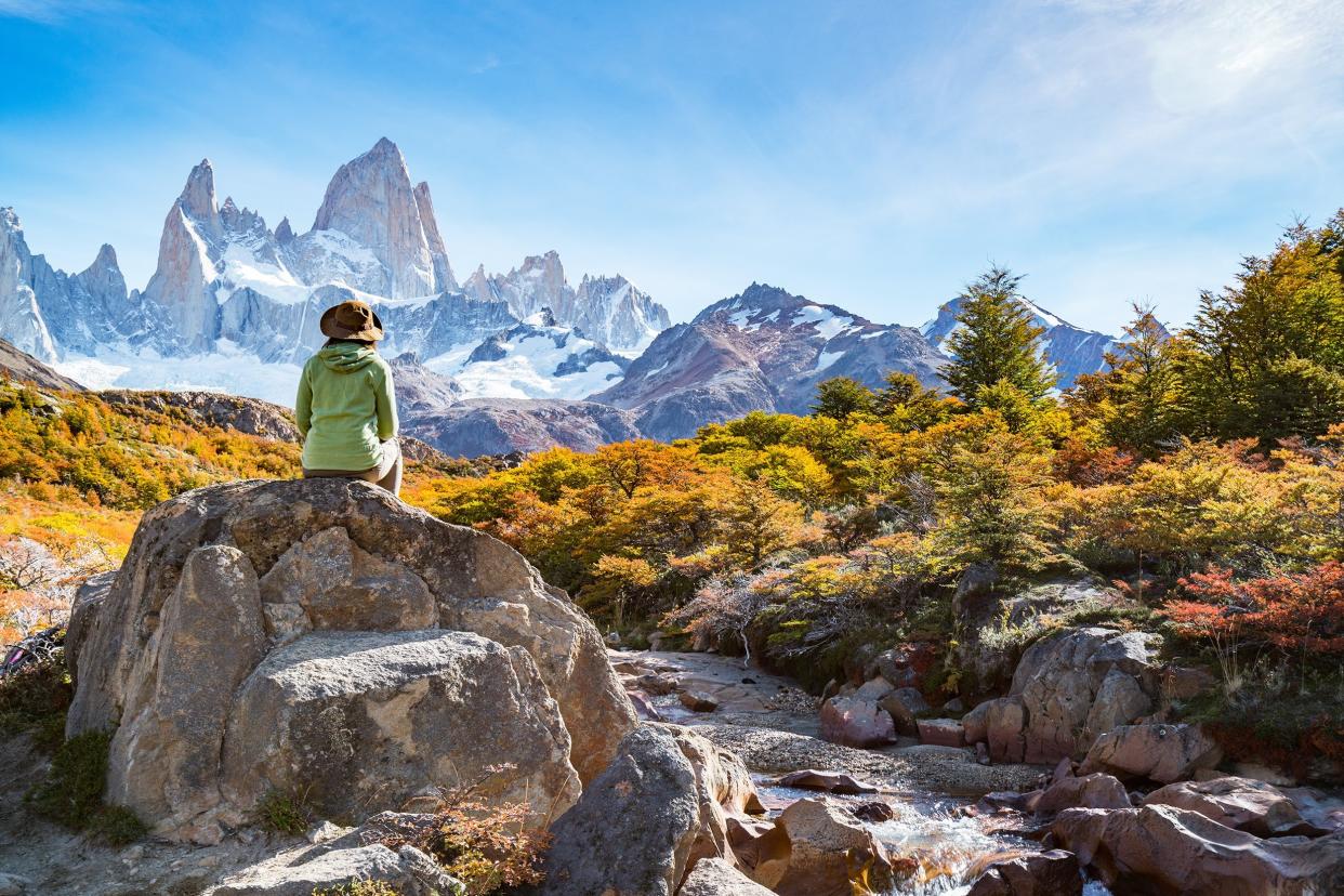 adventure traveler in autumn in Fitz Roy, Patagonia, Argentina