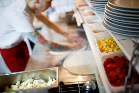 Ingredients can be seen inside the Apollo Pizzeria, in London, Britain, January 22, 2019. REUTERS/Henry Nicholls