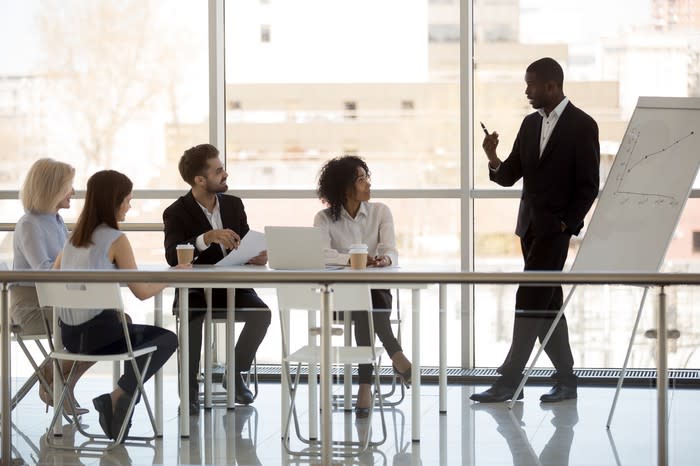 A manager leading a meeting.