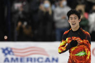 Nathan Chen competes in the men's free skate program during the U.S. Figure Skating Championships Sunday, Jan. 9, 2022, in Nashville, Tenn. (AP Photo/Mark Zaleski)