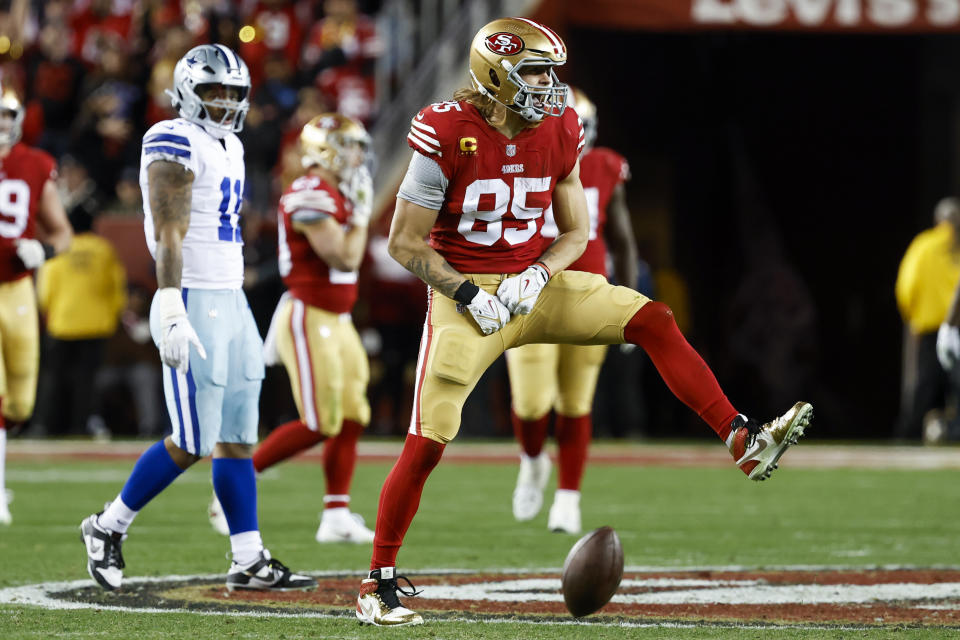 San Francisco 49ers tight end George Kittle (85) celebrates after catching a pass against the Dallas Cowboys during the second half of an NFL divisional round playoff football game in Santa Clara, Calif., Sunday, Jan. 22, 2023. (AP Photo/Josie Lepe)