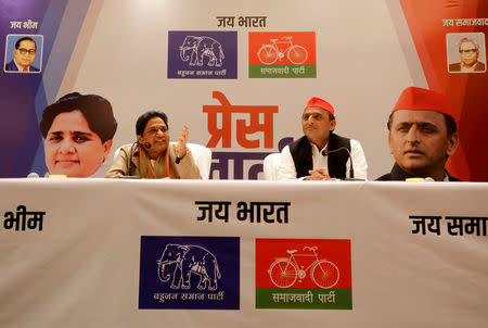 The Bahujan Samaj Party (BSP) chief Mayawati (L) speaks as Akhilesh Yadav, chief of Samajwadi Party (SP), looks on during a joint news conference to announce their alliance for the upcoming national election, in Lucknow, January 12, 2019. REUTERS/Pawan Kumar