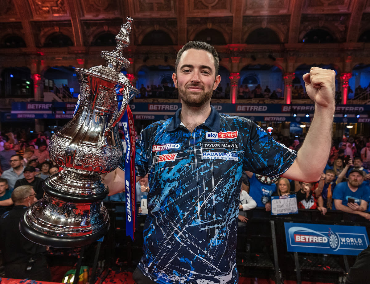 Luke Humphries holds the World Matchplay champion 