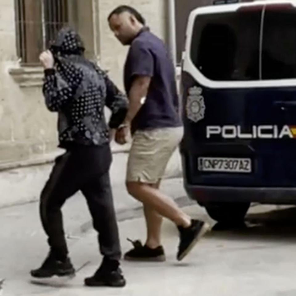 Vunipola is handcuffed as he enters court