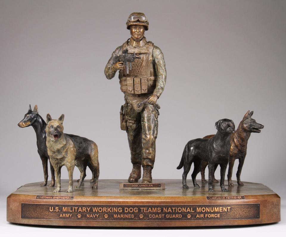 This undated publicity photo provided by John Burnam Monument Foundation, Inc., shows the frontal view of the U.S. Military Working Dog Teams National Monument. It is the first national monument ever to pay tribute to dogs and honors every dog who has served in combat since World War II. (AP Photo/John Burnam Monument Foundation, Inc.)