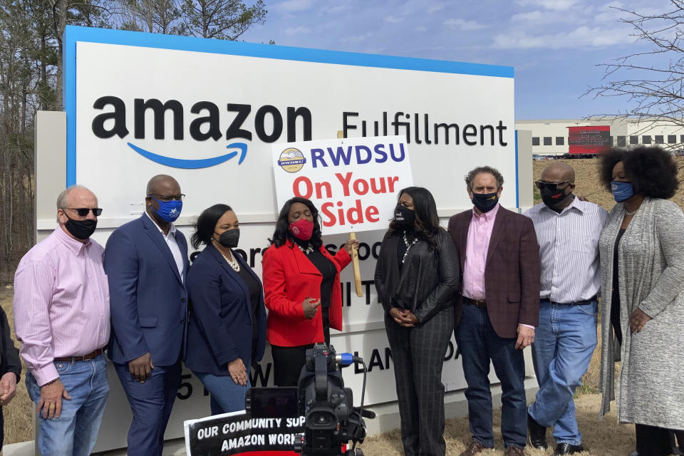 Democratic members of Congress join representatives of the Retail, Wholesale and Department Store Union gather outside an Amazon fulfillment center in Bessemer, Ala., on March 5, 2021, to advocate for the ongoing unionization vote at the sprawling campus. The elected officials pictured include, starting second from left, Rep. Jamaal Bowman of New York, Nikema Williams of Georgia, Terri Sewell of Alabama, Cori Bush of Missouri and Andy Levin of Michigan. (AP Photo/Bill Barrow)