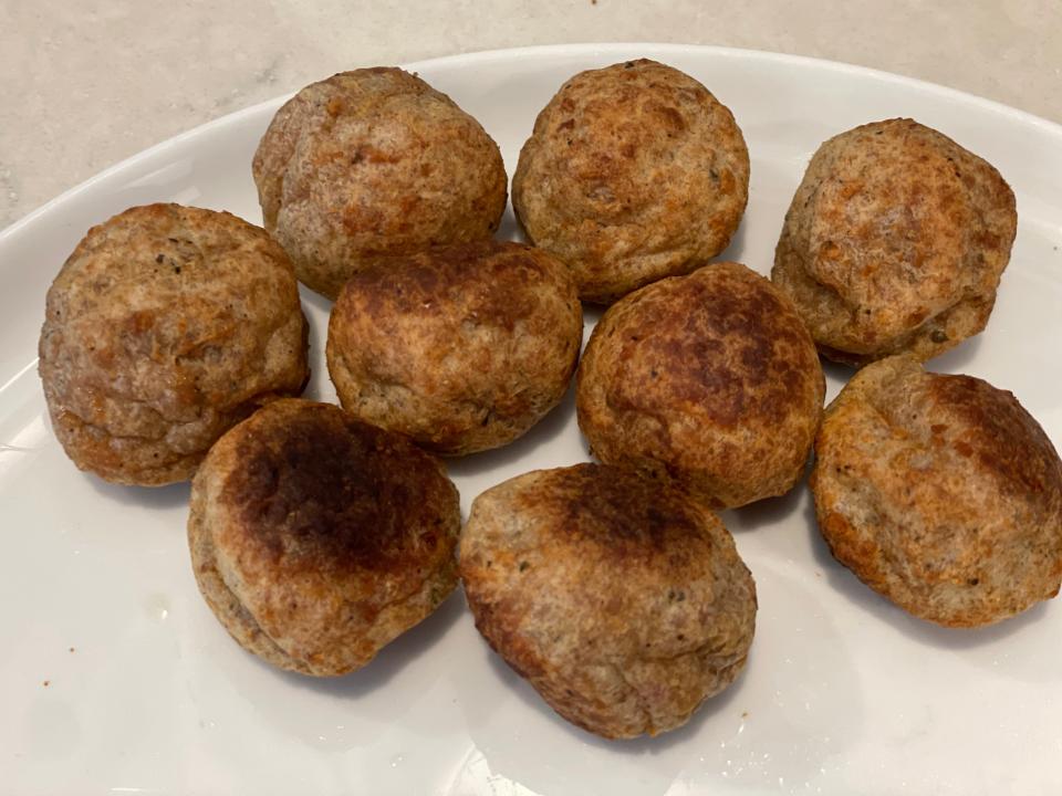 plate of cooked meatballs out of the oven