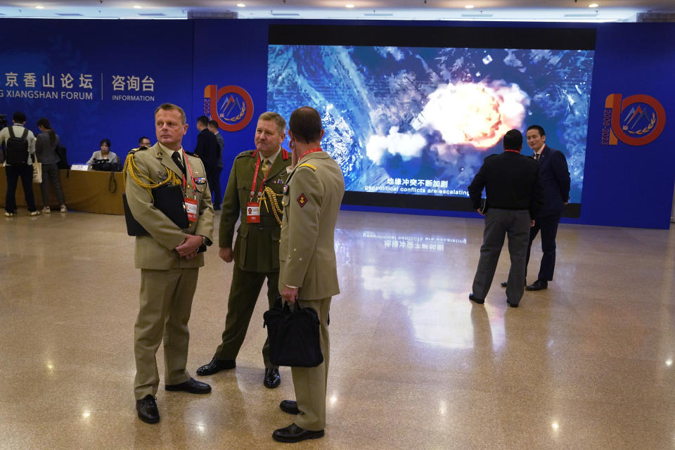 Attendees take part in the 10th Beijing Xiangshan Forum in Beijing, Monday, Oct. 30, 2023. Russian Defense Minister Sergei Shoigu said Monday the United States is fueling geopolitical tensions to uphold its "hegemony" and warned of the risk of confrontation between major countries. (AP Photo/Ng Han Guan)
